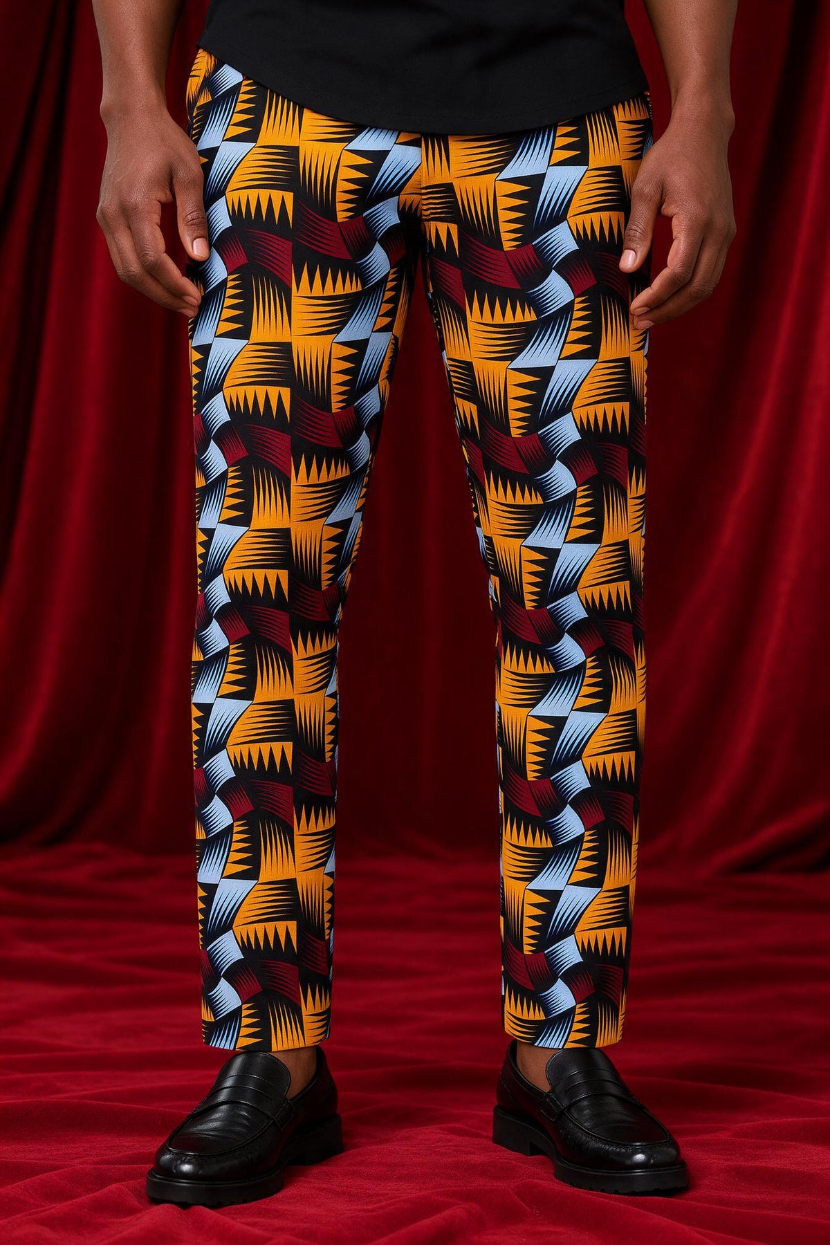 Front view of the Nala print trousers, sold separately from the tee.